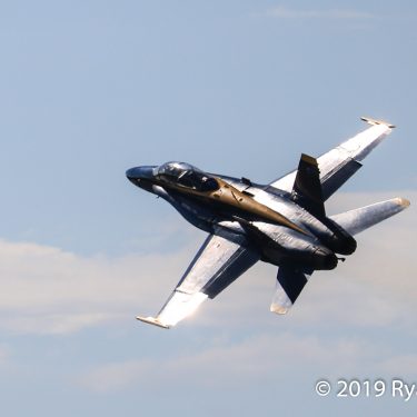Sun gleams off one of the U.S. Navy's Blue Angles F/A-18 Hornets. Copyright Ryan Healy 2019